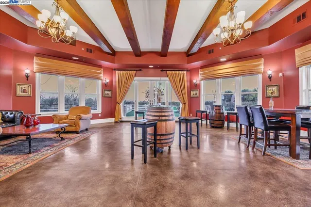 a dining room with furniture and window