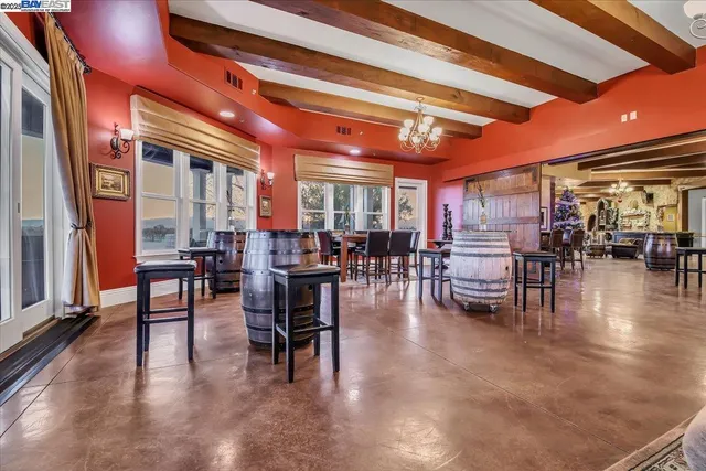 a kitchen with counter top space a sink and appliances
