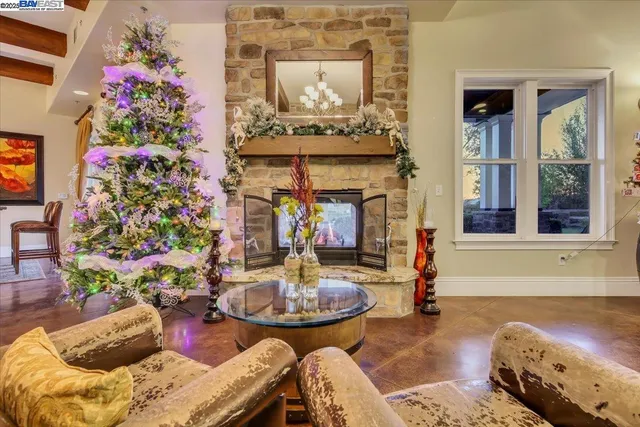 a kitchen with stainless steel appliances granite countertop a lot of cabinets