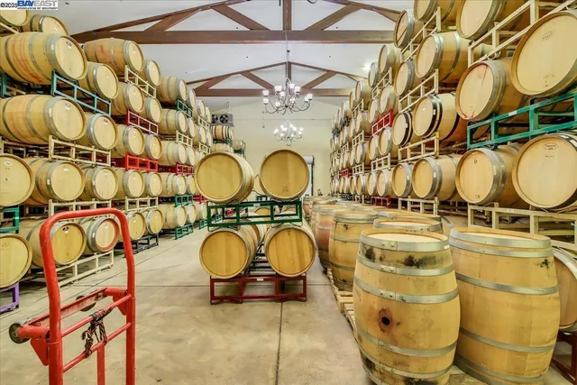 a view of cabinets and kitchen island with wooden floor