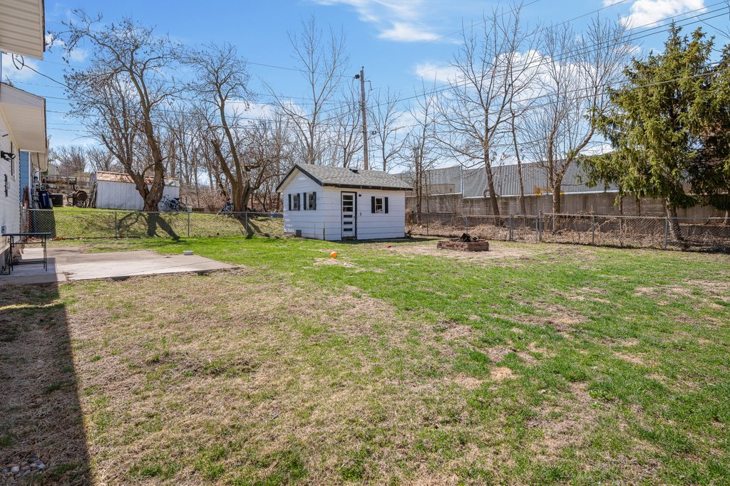 8012 10th Street West Rock Island, IL 61201 - Photo 6 of 27 a view of a house with a yard