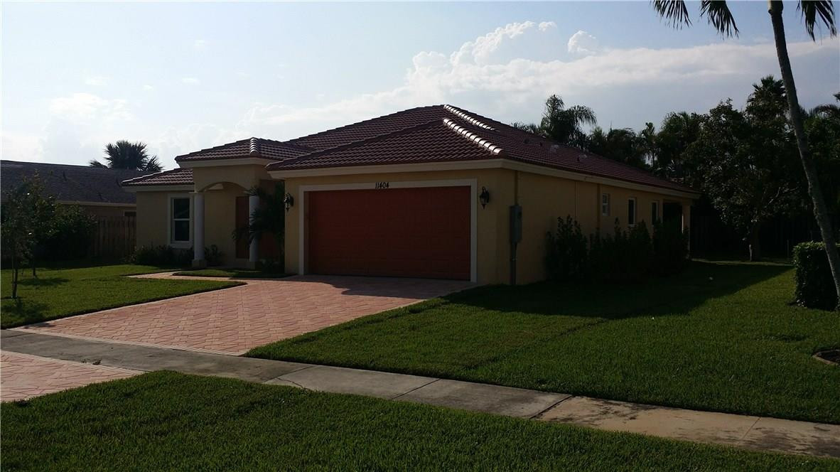 11404 Chipmunk Drive Boca Raton, FL 33428 - Photo 3 of 10 west side