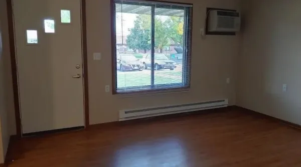 a view of a room that has a window in it