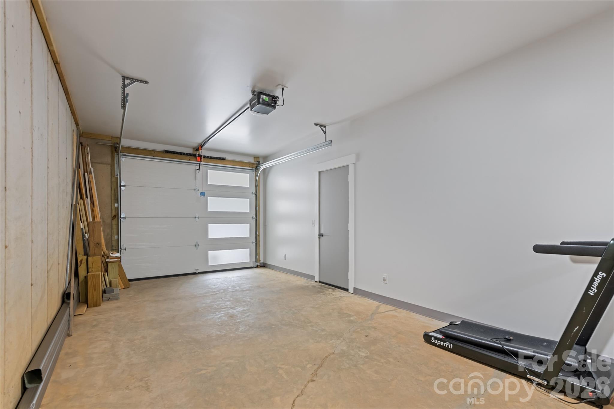 1185 Wallalieu Road Otto, NC 28763 - Photo 33 of 43 a view of a room with gym equipment