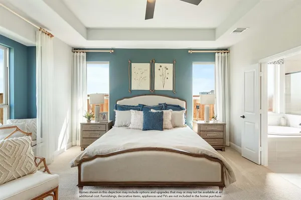 a bedroom with a large bed and a couch