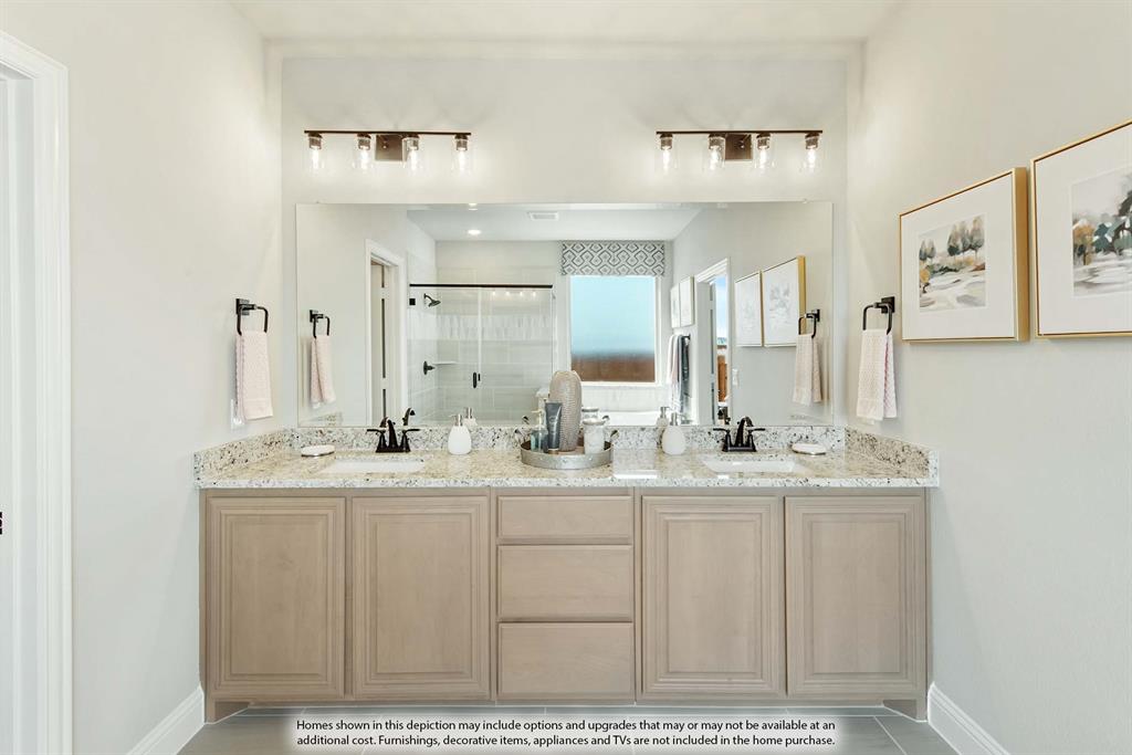 1133 Hitching Post Way Oak Point, TX 75068 - Photo 26 of 40 a bathroom with a sink and a mirror