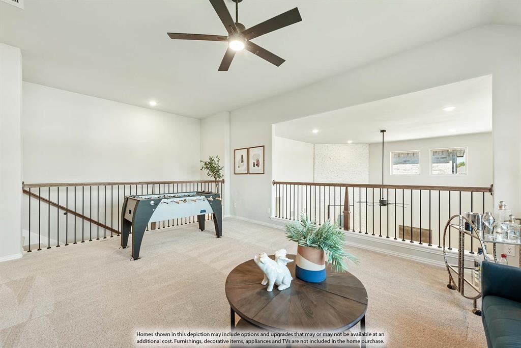 1133 Hitching Post Way Oak Point, TX 75068 - Photo 34 of 40 a living room with furniture and a wooden floor
