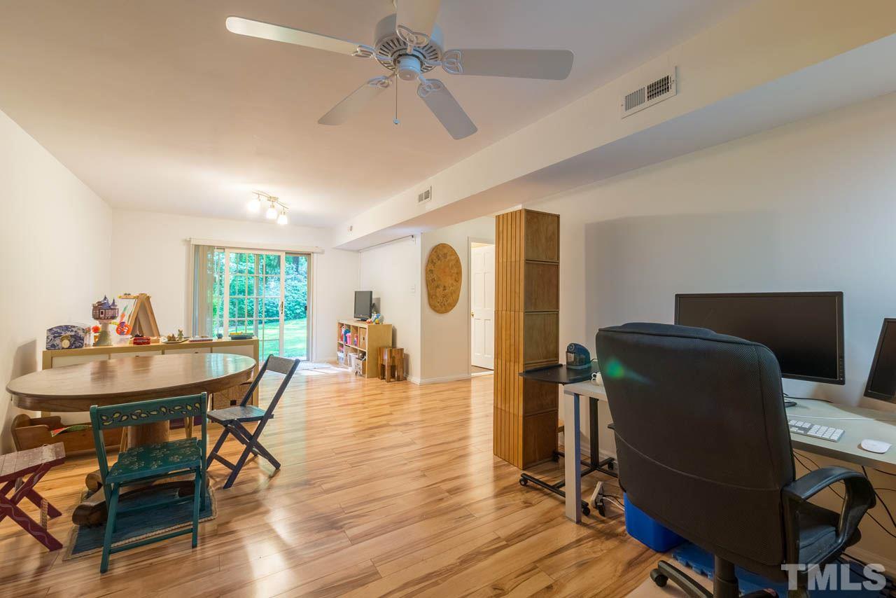 1700 Tropical Drive Raleigh, NC 27607 - Photo 19 of 25 a view of a livingroom with furniture and a dining table