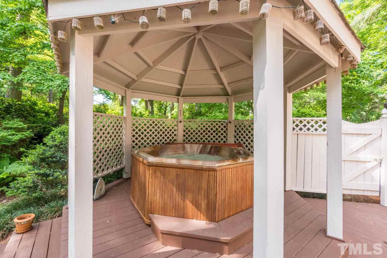 1700 Tropical Drive Raleigh, NC 27607 - Photo 23 of 25 a white house with a outdoor space