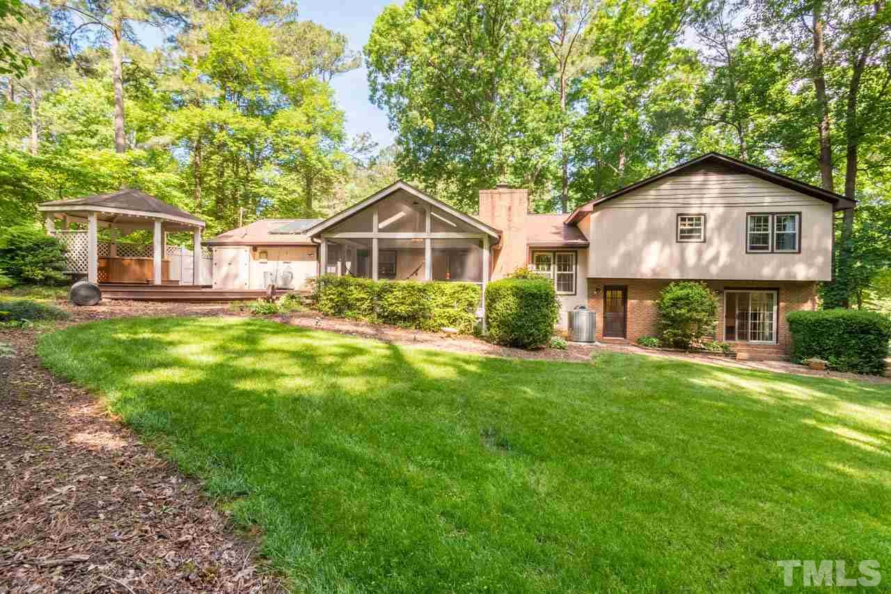 1700 Tropical Drive Raleigh, NC 27607 - Photo 24 of 25 a front view of a house with a yard