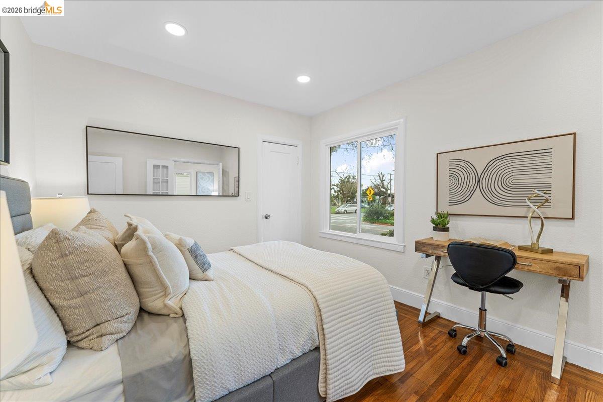 2717 Mabel Street Berkeley, CA 94702 - Photo 41 of 60 a bedroom with a bed and a chandelier