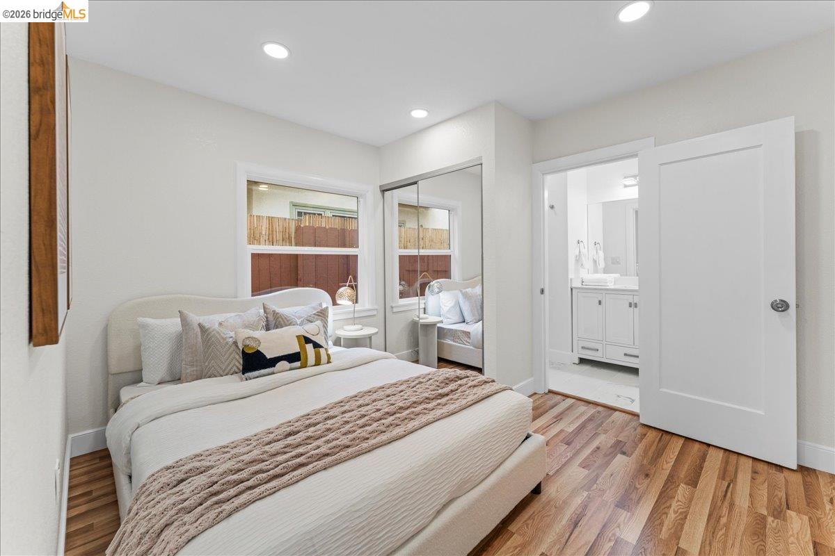 2717 Mabel Street Berkeley, CA 94702 - Photo 44 of 60 a bedroom with a bed and a large window
