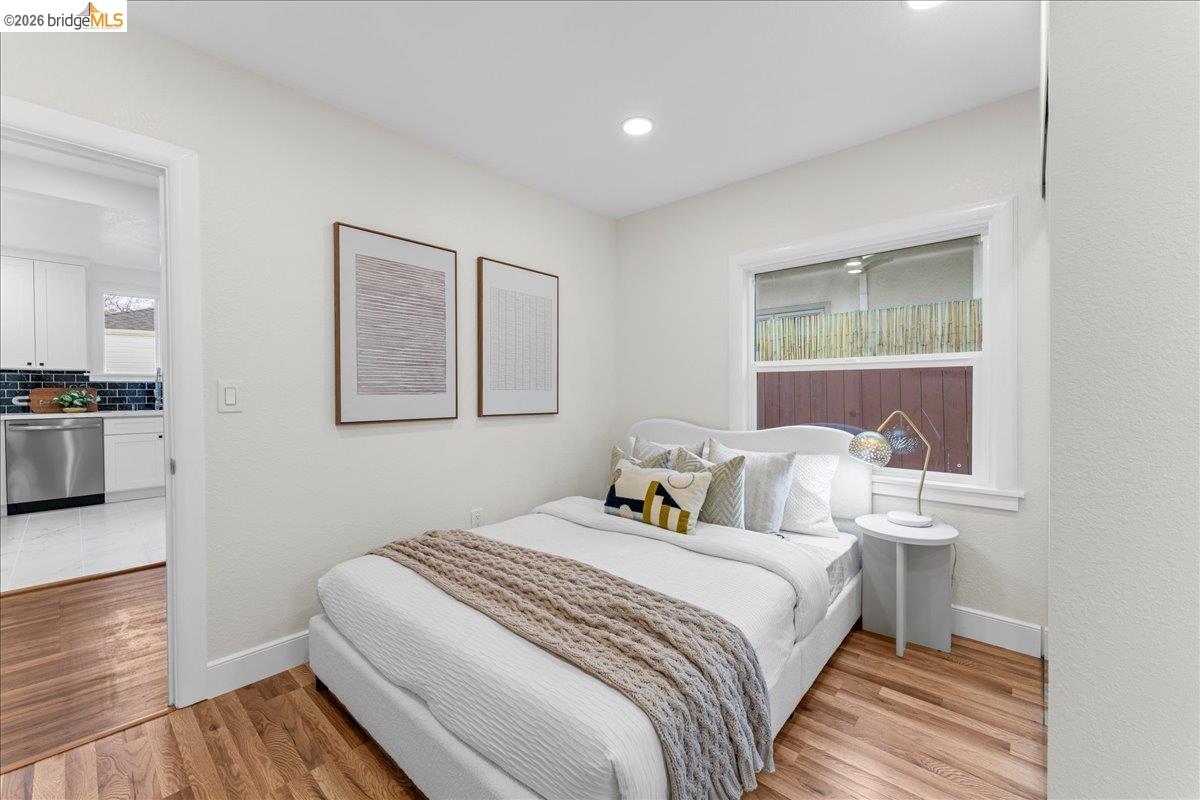 2717 Mabel Street Berkeley, CA 94702 - Photo 45 of 60 a bedroom with a bed and a view of kitchen