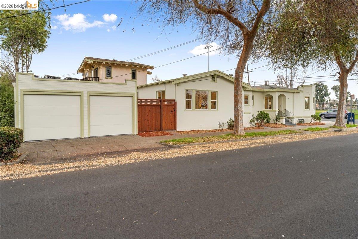 2717 Mabel Street Berkeley, CA 94702 - Photo 53 of 60 a front view of a house with a yard and garage