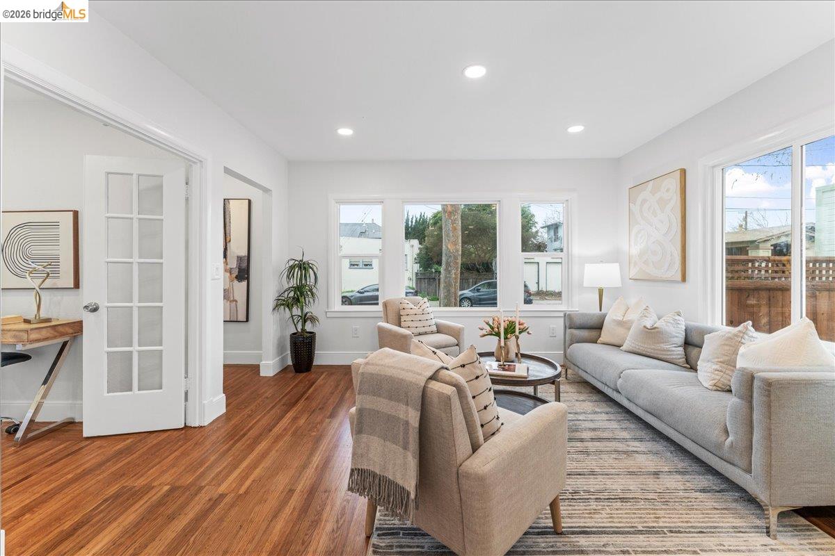 2717 Mabel Street Berkeley, CA 94702 - Photo 6 of 60 a living room with furniture and a large window