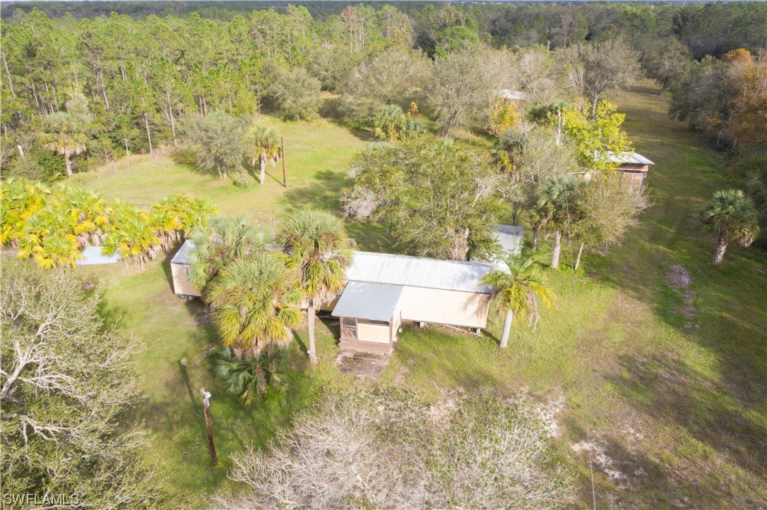 47710 Bermont Road Punta Gorda, FL 33982 - Photo 15 of 40 a garden view with a lake view