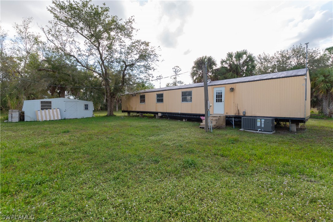 47710 Bermont Road Punta Gorda, FL 33982 - Photo 22 of 40 a view of a house with backyard
