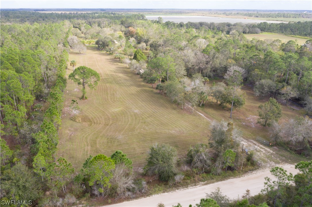 47710 Bermont Road Punta Gorda, FL 33982 - Photo 4 of 40 a view of a lake with mountain view