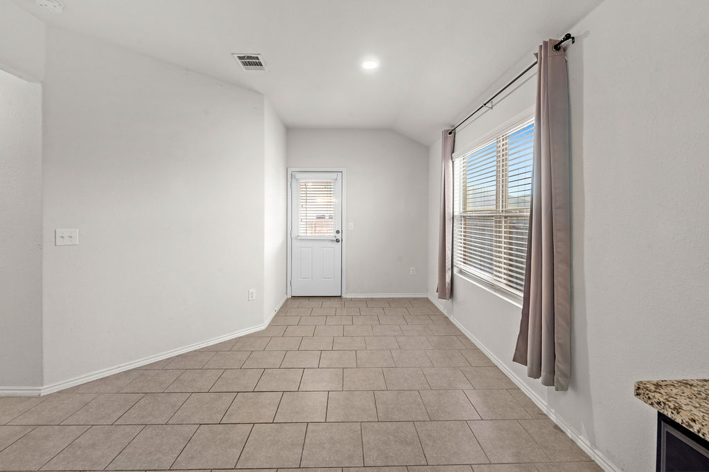 3621 Colorado High Avenue Austin, TX 78744 - Photo 11 of 40 a view of an empty room and window