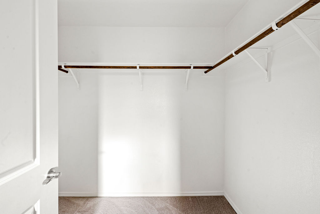 3621 Colorado High Avenue Austin, TX 78744 - Photo 23 of 40 a view of walk in closet with clothes