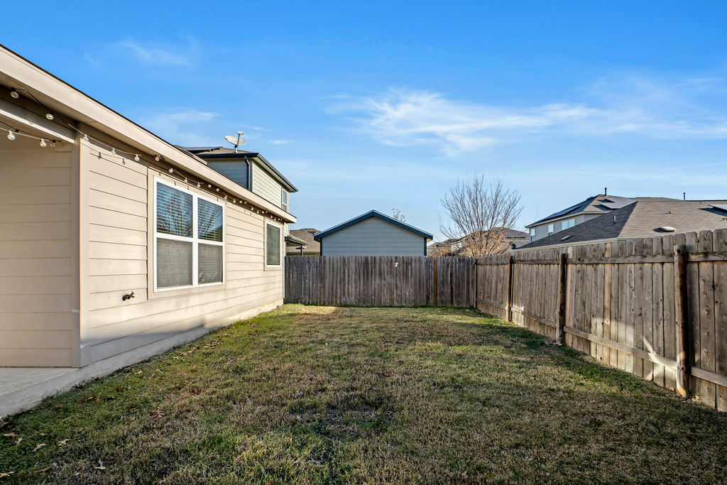 3621 Colorado High Avenue Austin, TX 78744 - Photo 32 of 40 a view of a small yard in front of a house