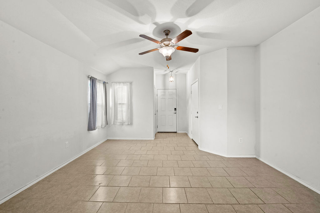 3621 Colorado High Avenue Austin, TX 78744 - Photo 4 of 40 a view of an empty room with a window
