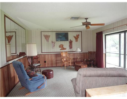 6000 Melaleuca Road Southwest Ranches, FL 33330 - Photo 8 of 19 a living room with furniture and a window