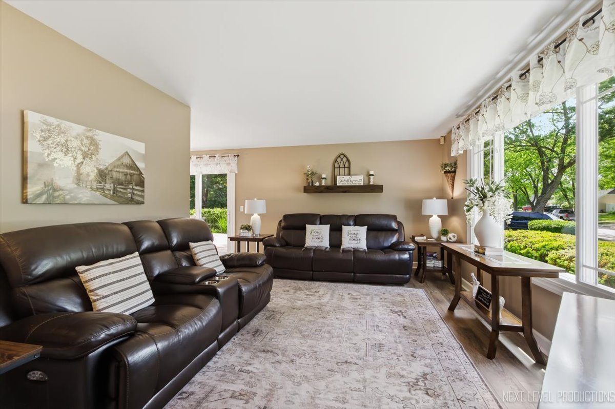 10 Shermead Road Montgomery, IL 60538 - Photo 5 of 30 a living room with furniture and a large window