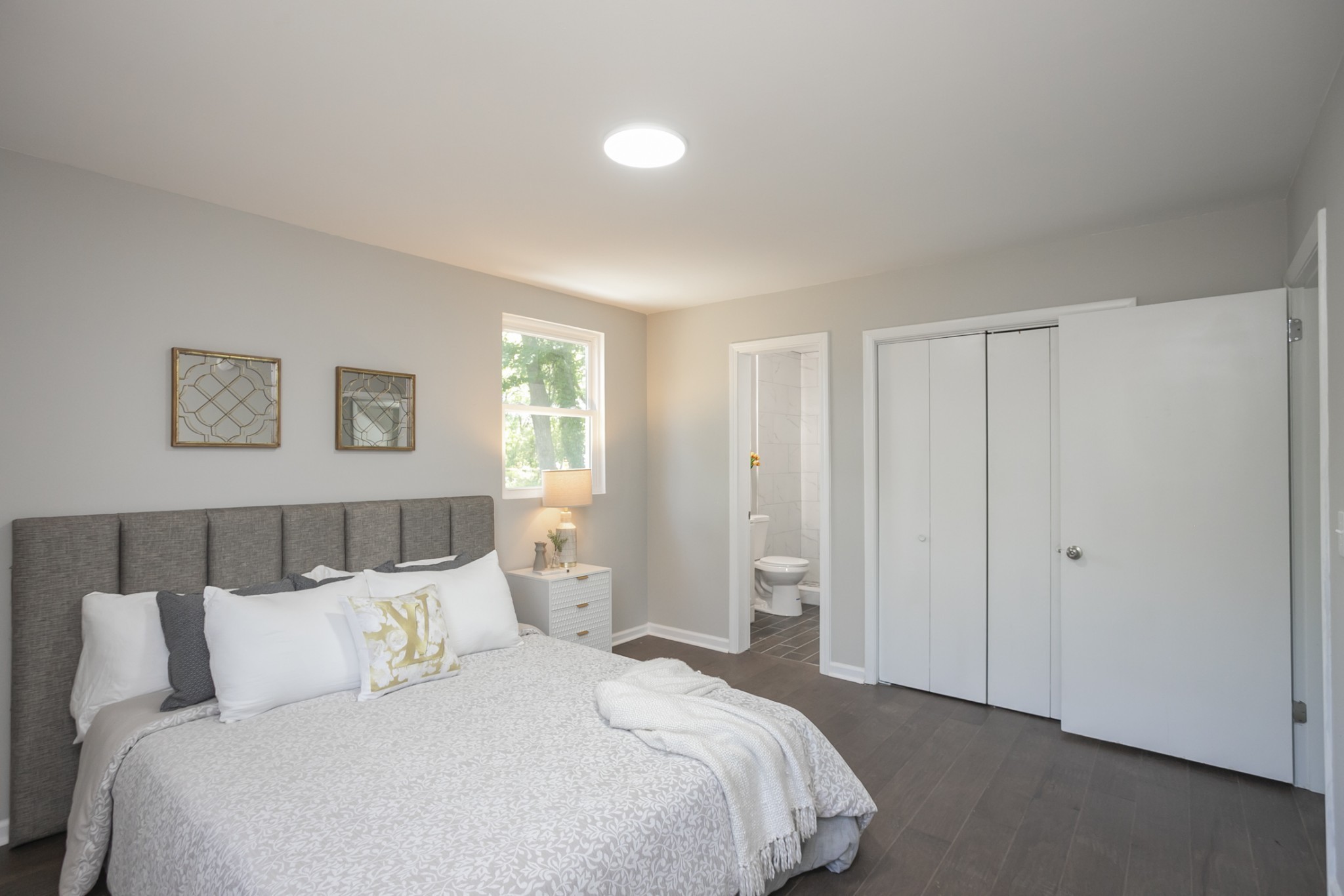 2966 Anderson Road Nashville, TN 37217 - Photo 11 of 23 a bedroom with a large bed and a night stand