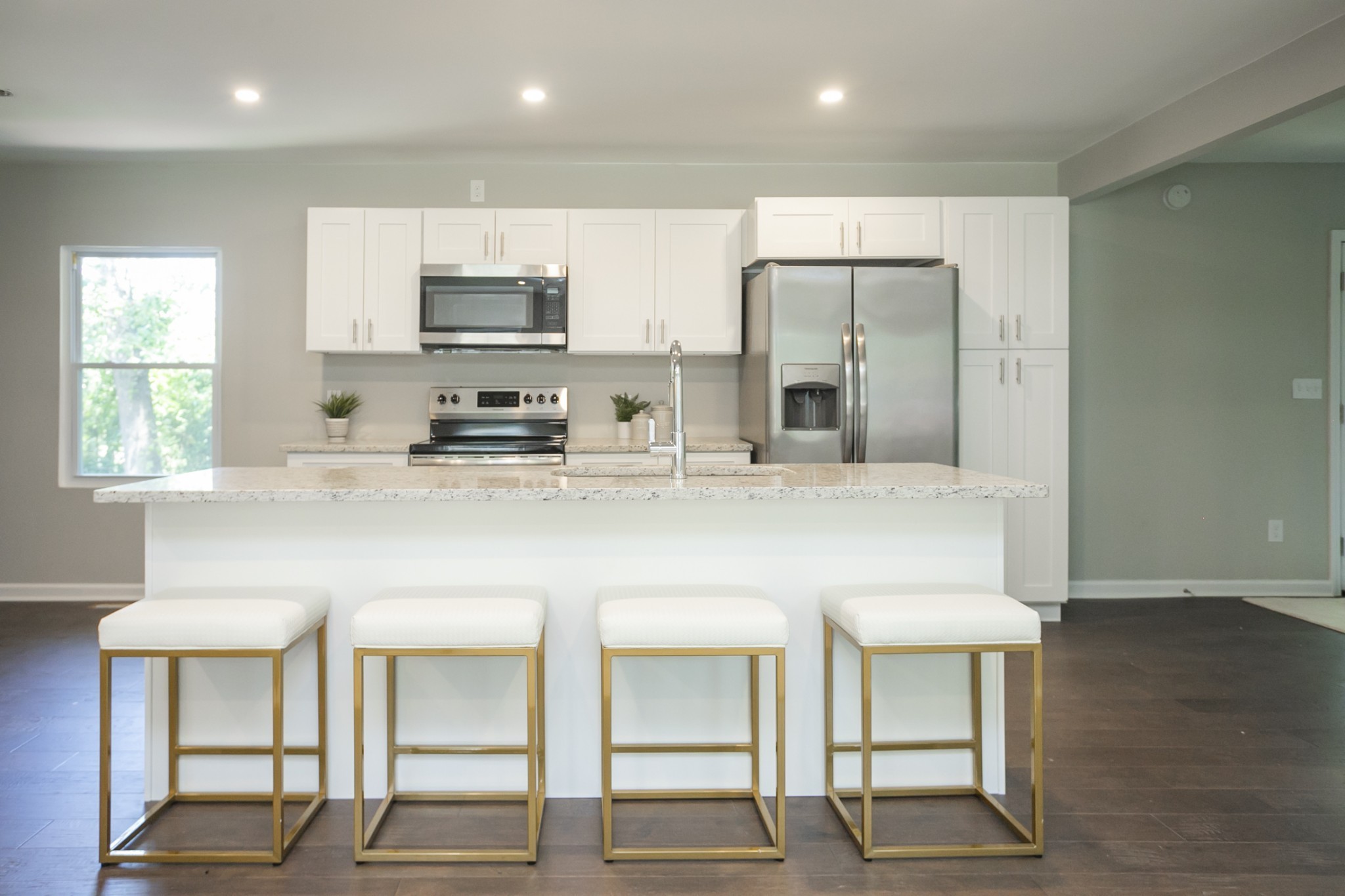 2966 Anderson Road Nashville, TN 37217 - Photo 15 of 23 a kitchen with stainless steel appliances a sink stove and refrigerator