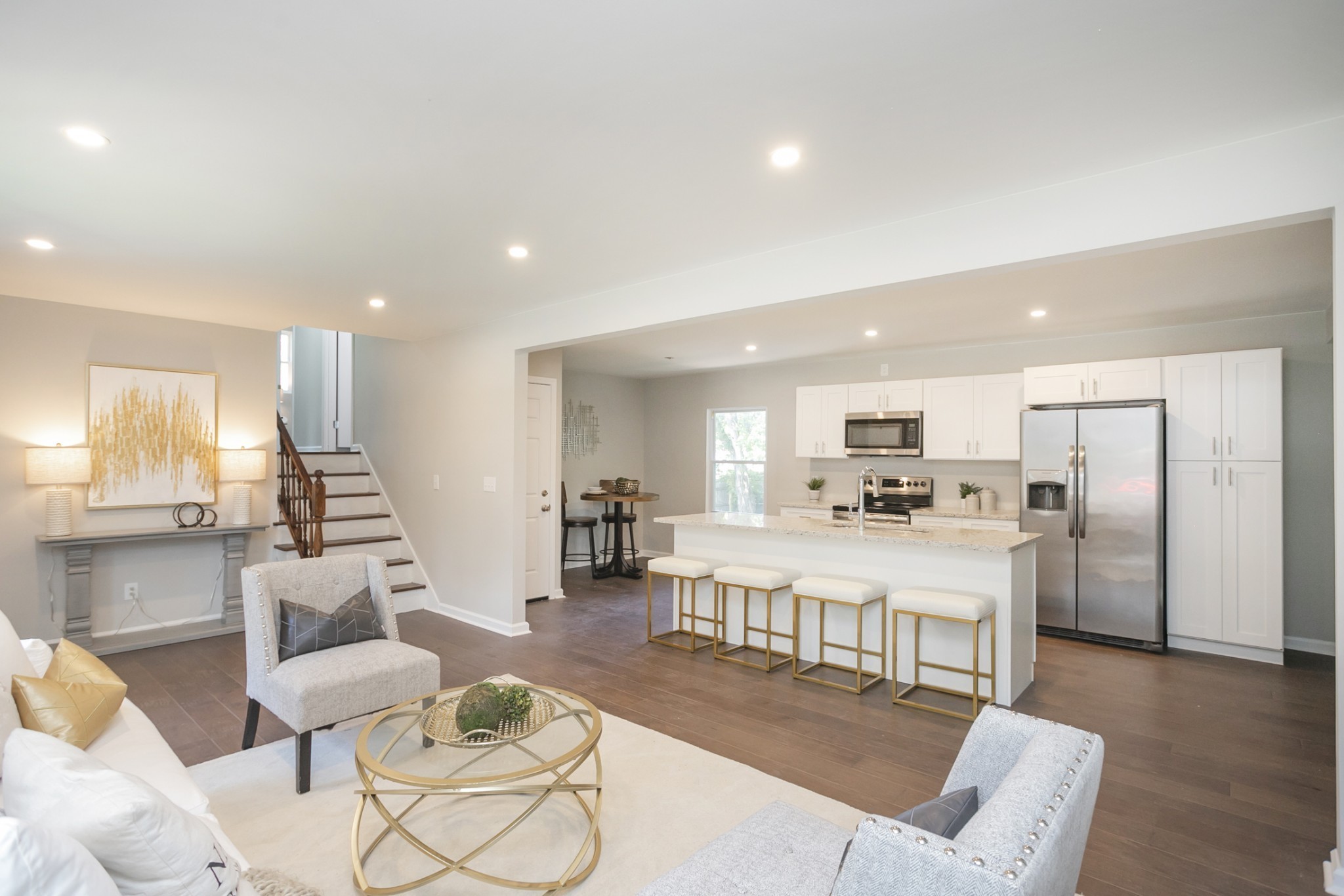 2966 Anderson Road Nashville, TN 37217 - Photo 2 of 23 a living room with stainless steel appliances kitchen island granite countertop furniture and a kitchen view