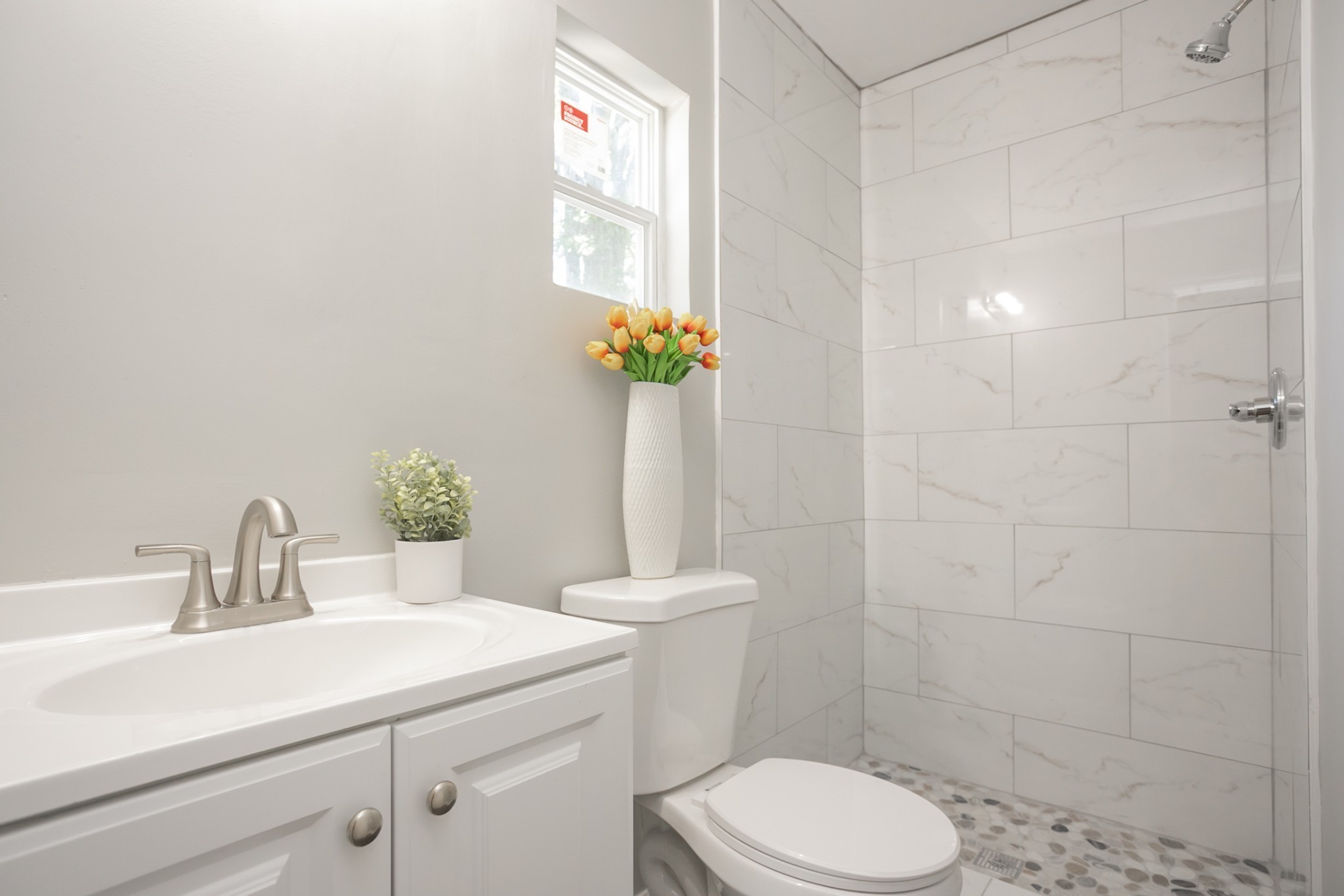 2966 Anderson Road Nashville, TN 37217 - Photo 9 of 23 a bathroom with a sink a toilet and a mirror