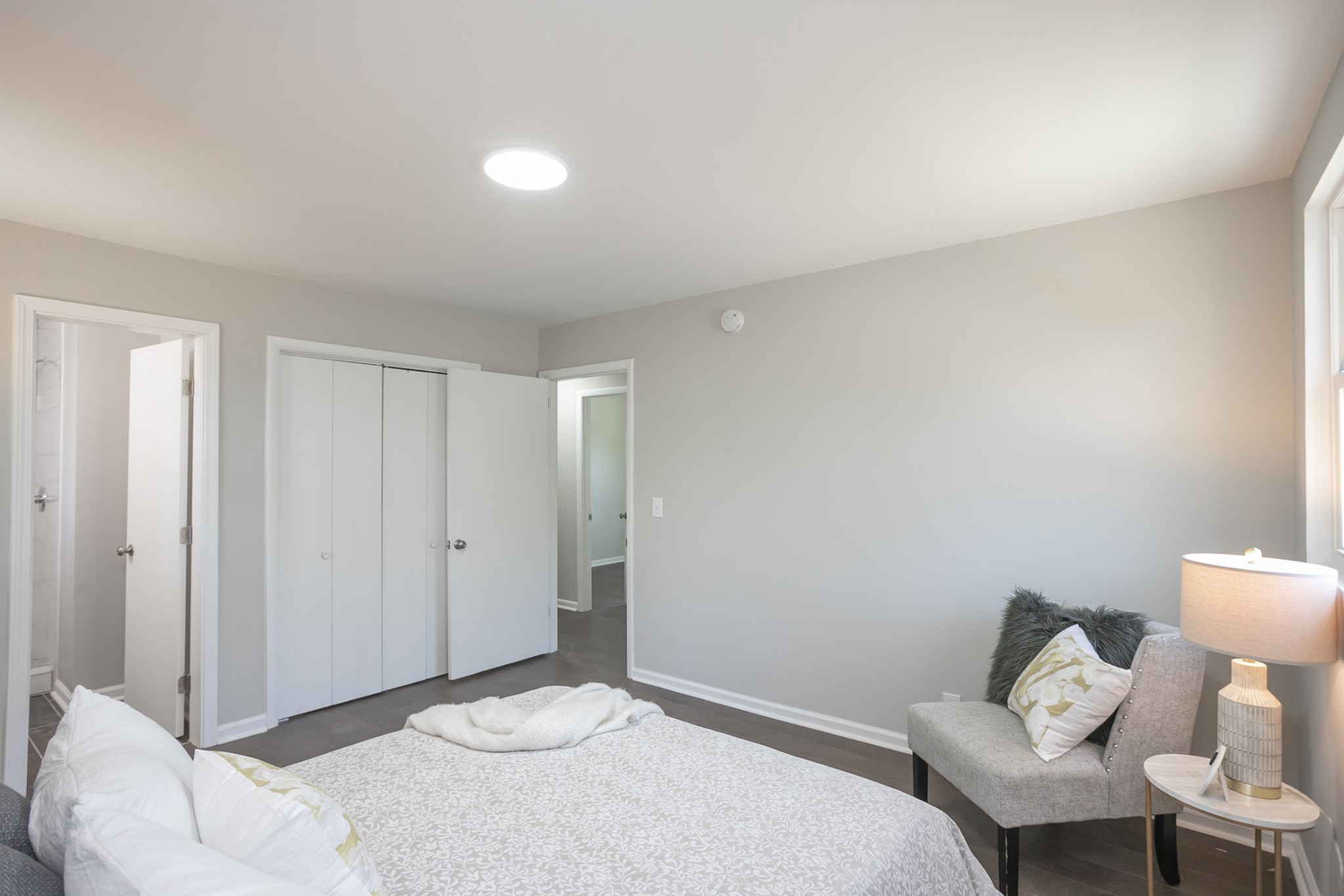 2966 Anderson Road Nashville, TN 37217 - Photo 10 of 23 a bedroom with a bed and a chair