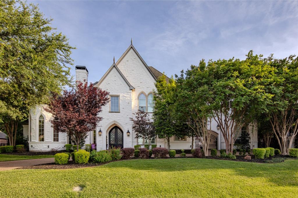 509 King Ranch Road Southlake, TX 76092 - Photo 1 of 40 a front view of a house with garden