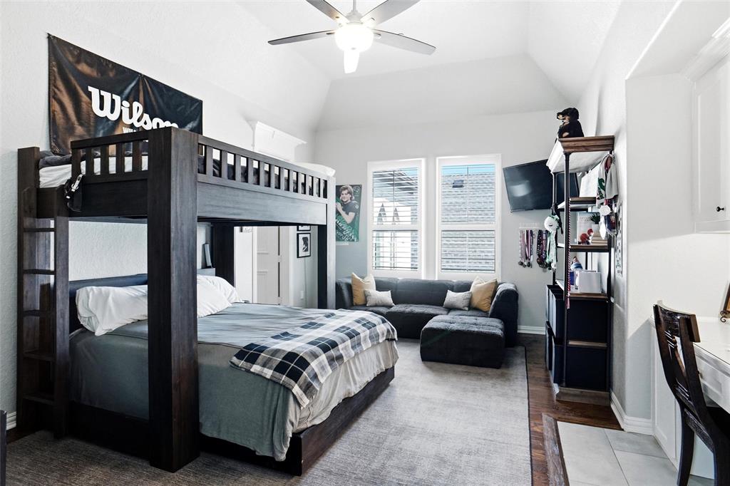 509 King Ranch Road Southlake, TX 76092 - Photo 27 of 40 a bedroom with a bed furniture and a window