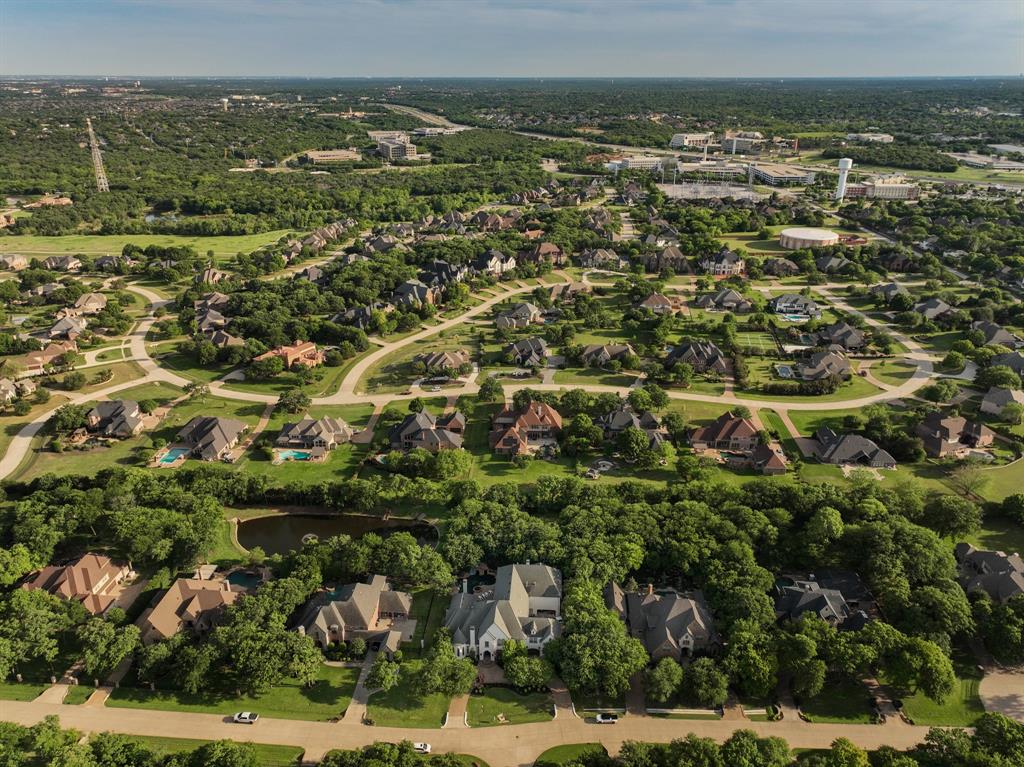 509 King Ranch Road Southlake, TX 76092 - Photo 35 of 36 Aerial perspective showcasing a residential community with abundant mature trees and curving streets