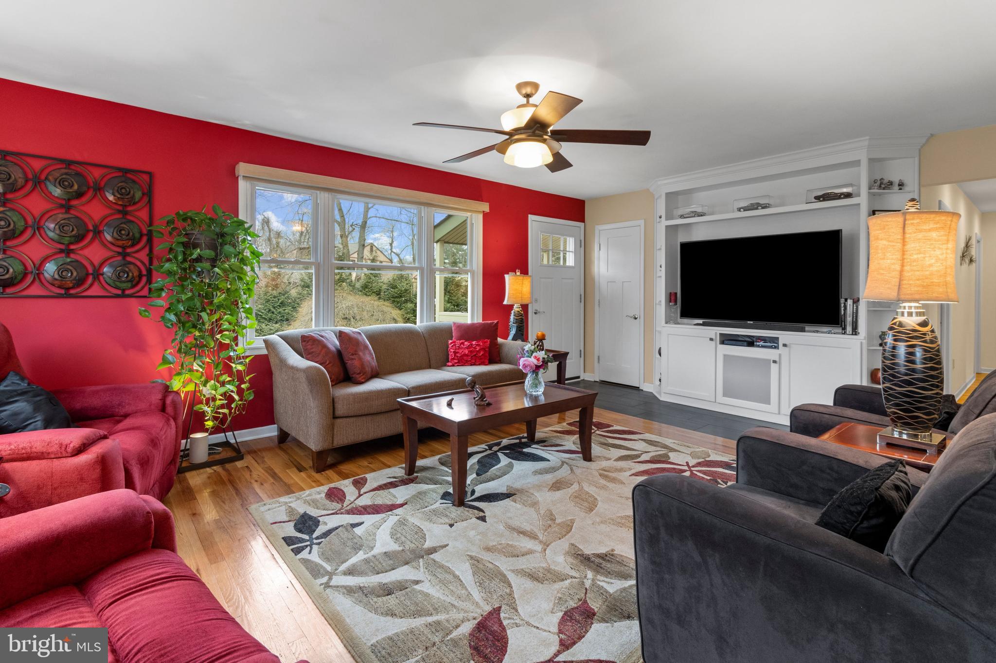 944 Pebble Hill Road Doylestown, PA 18901 - Photo 15 of 51 Family Room w/ Built in Cabinet and access to deck