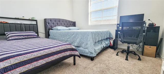 a bathroom with a toilet and a sink