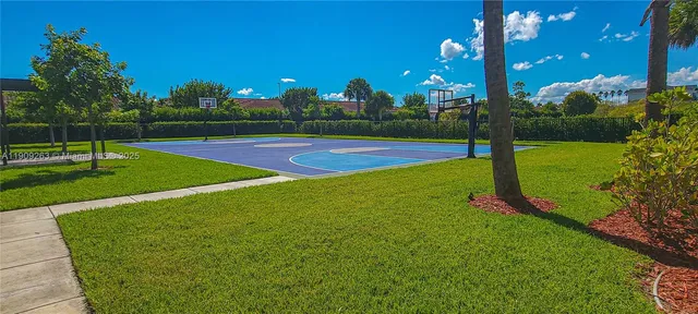 a view of a park with large trees