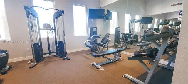 a view of a lake with a house in the background