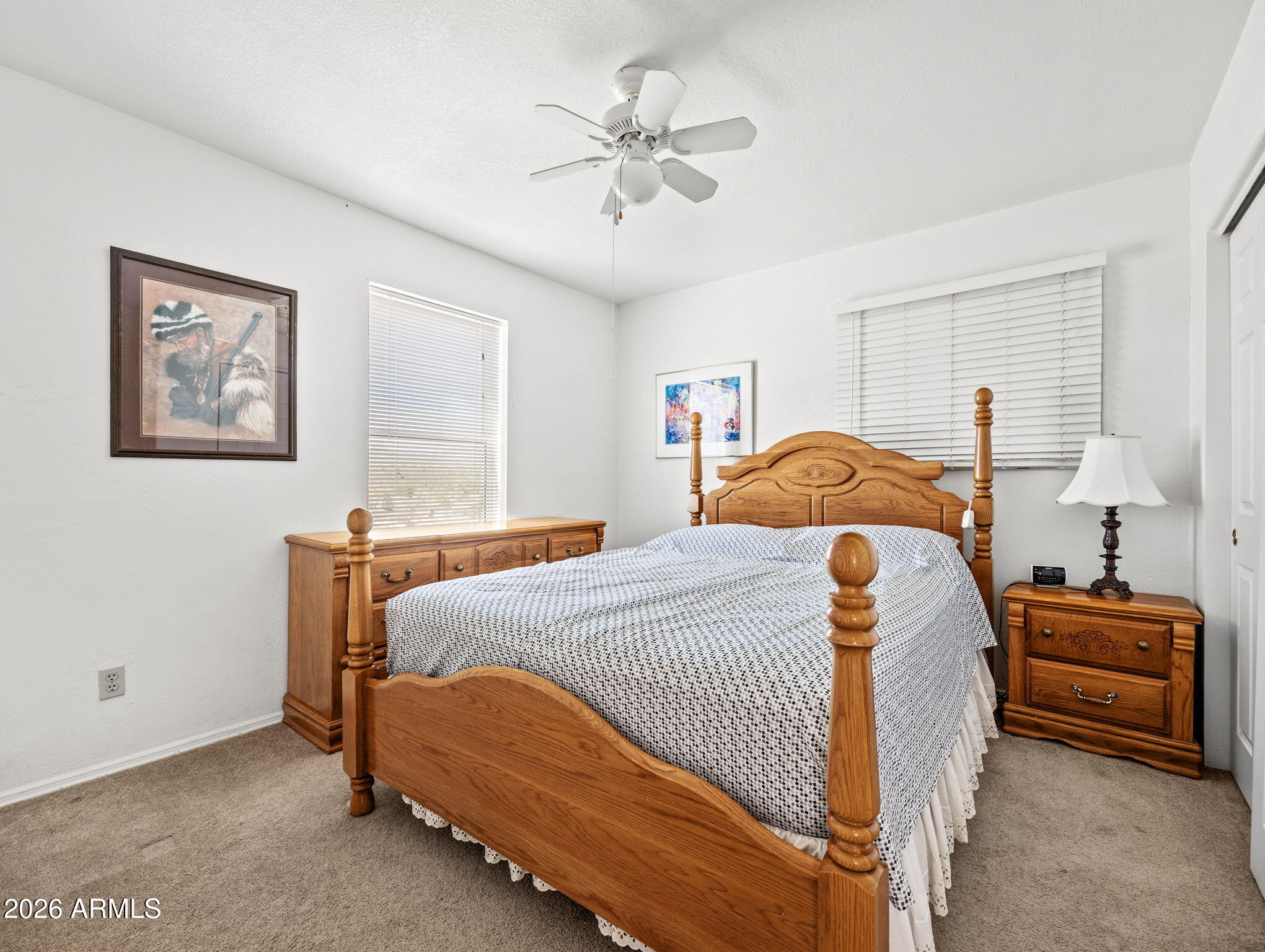 18420 Peeples Valley Road Peeples Valley, AZ 86332 - Photo 19 of 31 a bedroom with a bed and window