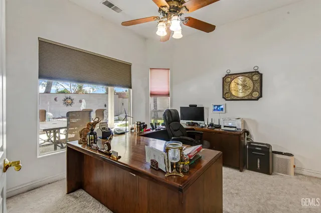 a bathroom with a sink a vanity and a mirror