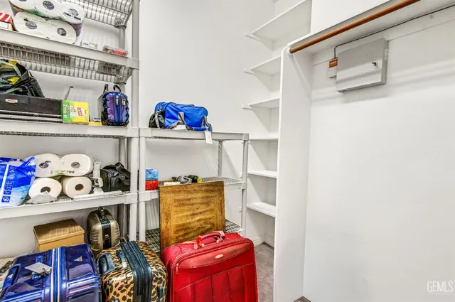 a view of backyard with plants and outdoor seating