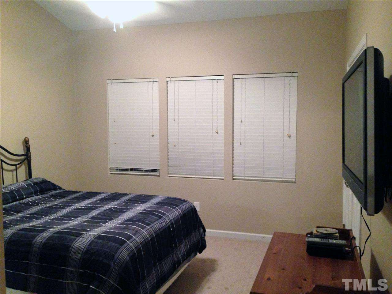 705 Glen Road, Unit 112 Garner, NC 27529 - Photo 6 of 12 Master Bedroom with brand new carpets throughout Master Bedroom