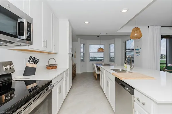 a kitchen with a stove and a sink