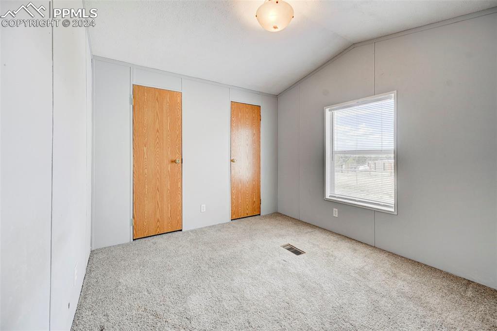 804 Sioux Avenue Simla, CO 80835 - Photo 6 of 17 an empty room with windows
