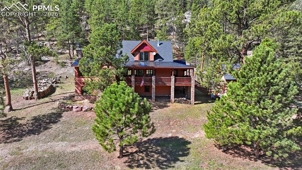 89 Ranch View Road Florissant, CO 80816 - Photo 4 of 50 The elevated entrance helps provide stunning views from the porch and throughout the home.