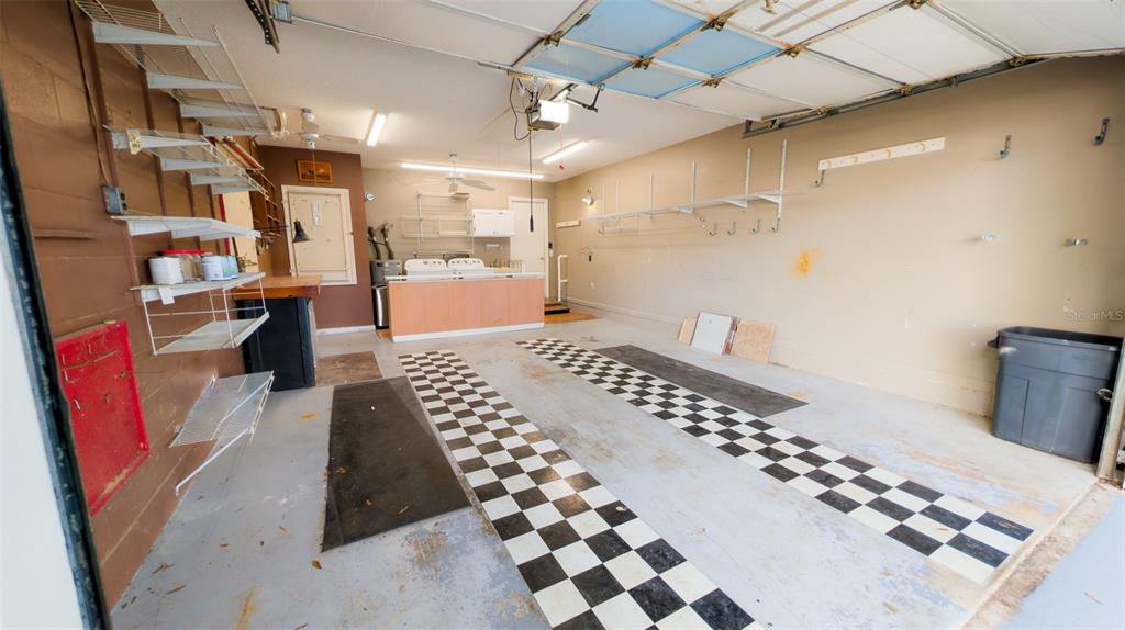 9357 Southwest 82nd Terrace, Unit C Ocala, FL 34481 - Photo 23 of 30 a large room with lots of appliances