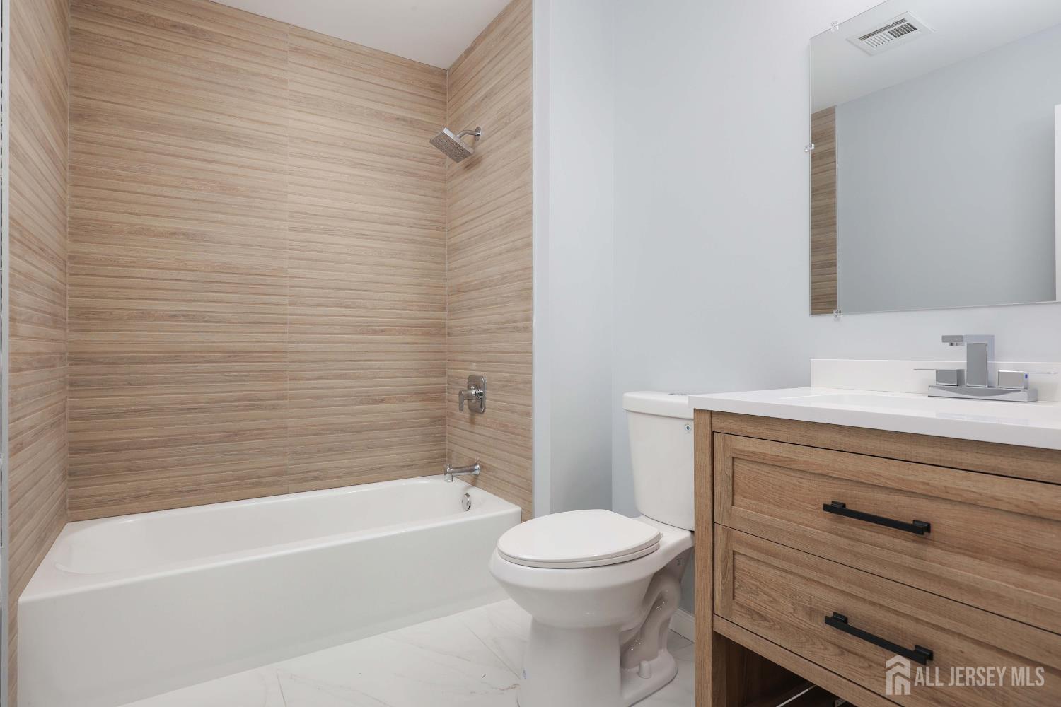 4 Ellison Court Keyport, NJ 07735 - Photo 20 of 37 a bathroom with a sink a toilet and bathtub