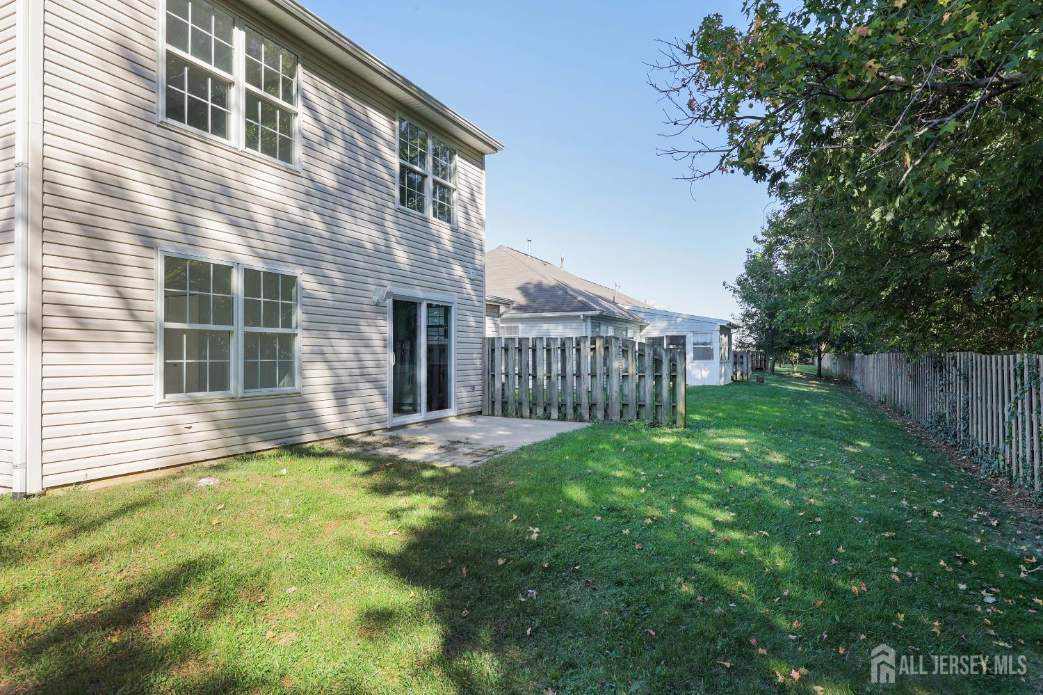4 Ellison Court Keyport, NJ 07735 - Photo 30 of 37 a view of a house with backyard and sitting area